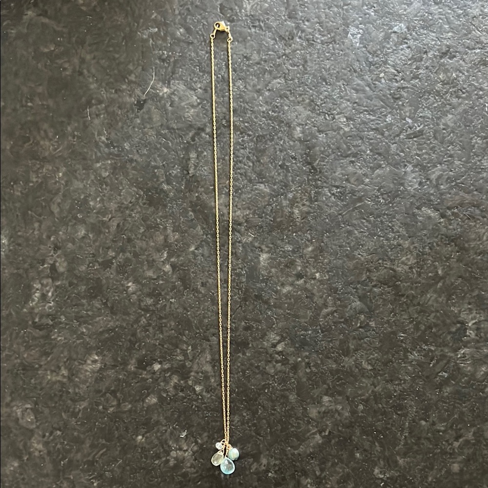 Elegant Gold Necklace with Blue Pendant